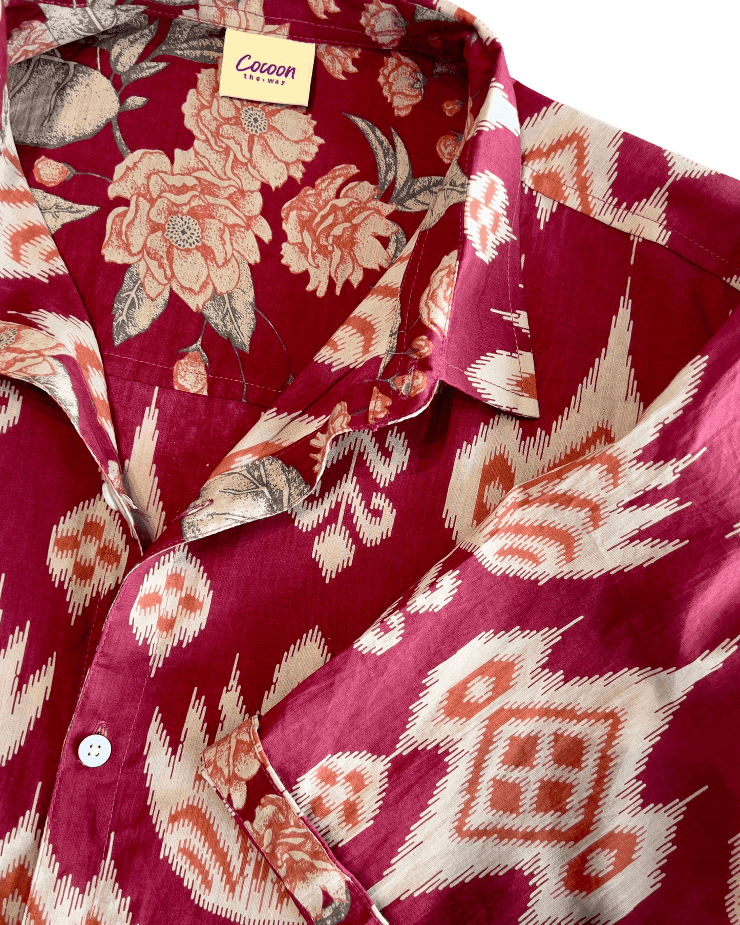 PADMA Short Sleeve Shirt Cherry Ikat featuring floral and geometric patterns in rich red tones.
