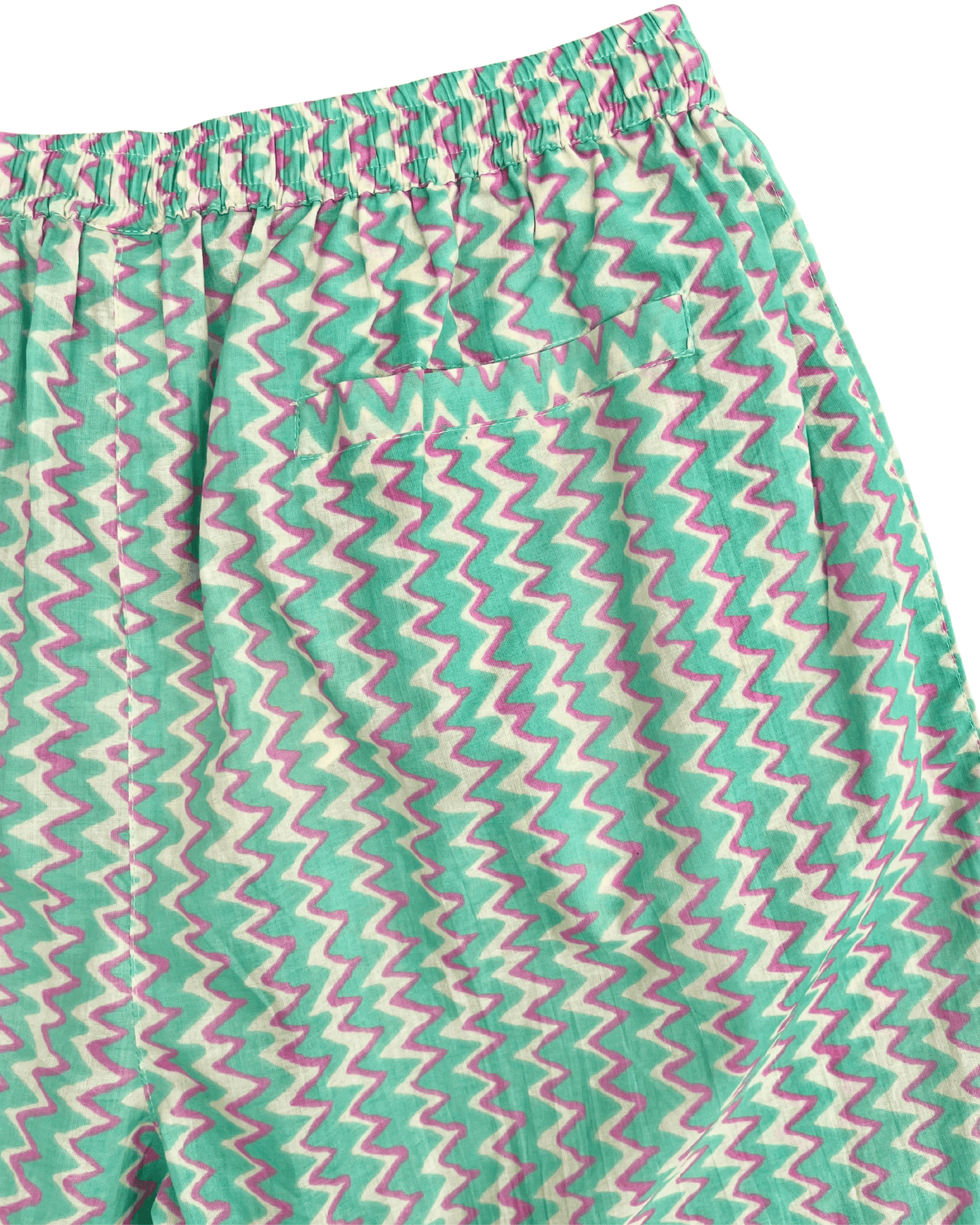 PADMA Cotton Shorts in Neon Bloom pattern featuring a colorful zigzag design and elastic waistband.