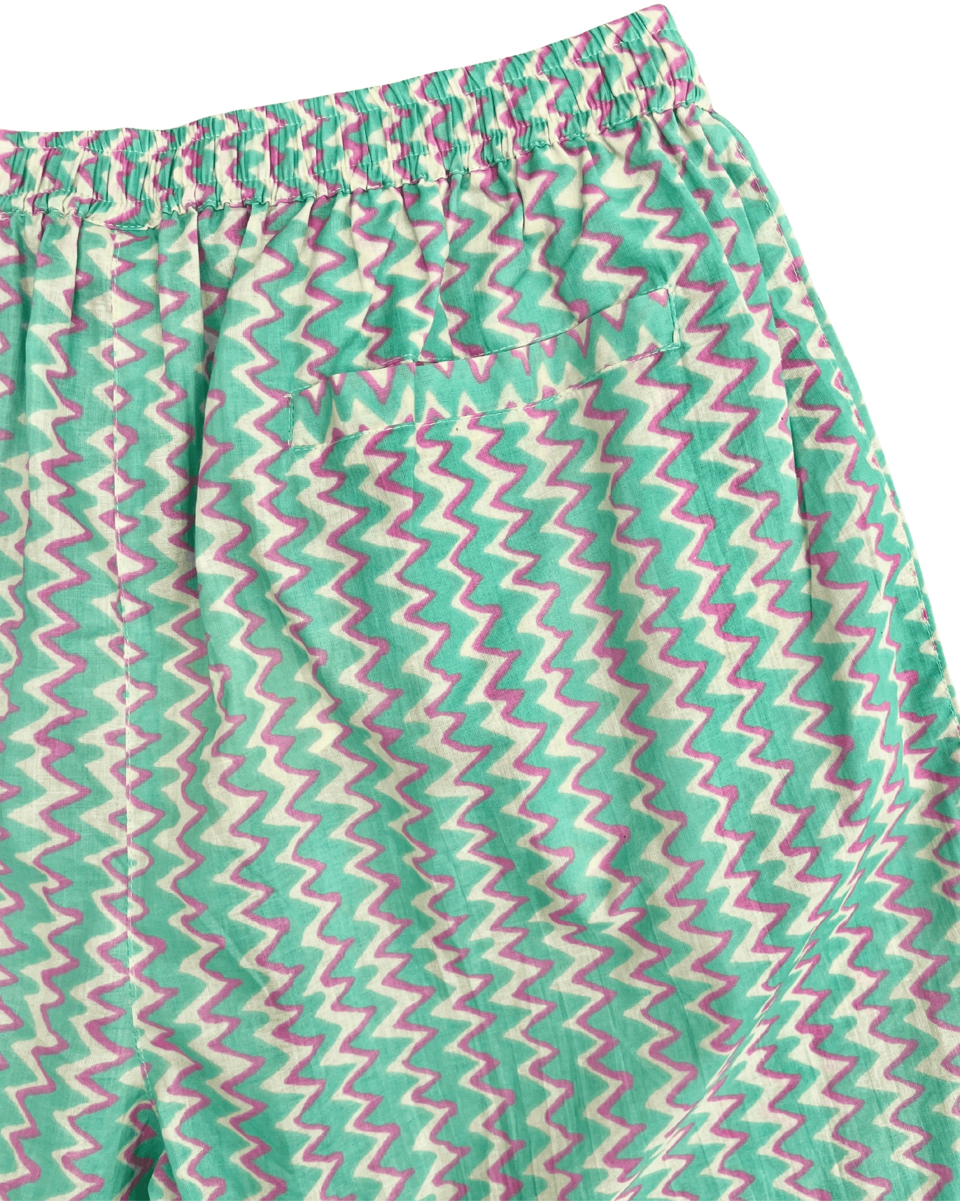 PADMA Cotton Shorts in Neon Bloom pattern featuring a colorful zigzag design and elastic waistband.