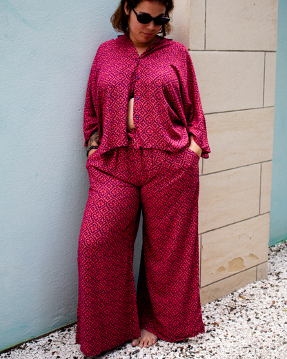 Model wearing OLIVIA Pants in Violetta with a relaxed fit and wide leg, showcasing effortless elegance and comfort.