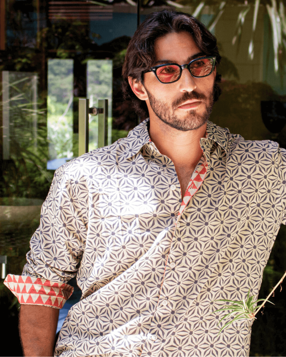 Model wearing the SAIRA Long Sleeve Shirt, featuring a unique pattern and stylish design, perfect for refined everyday wear.
