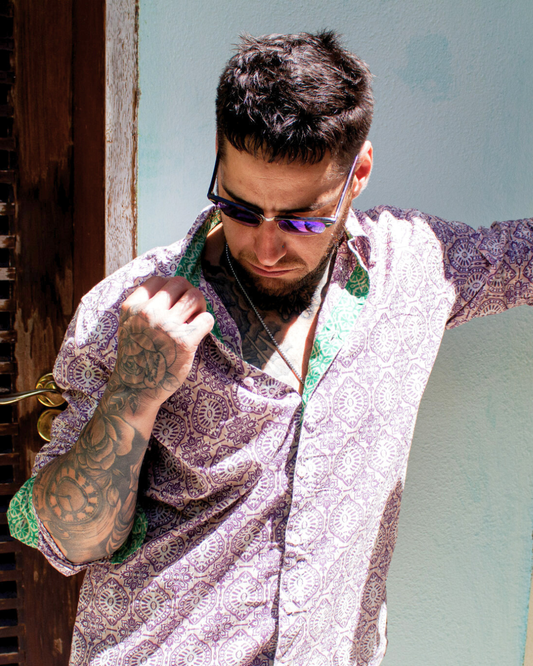 A model showcasing the SAIRA Long Sleeve Shirt in patterned fabric, exuding style and confidence.