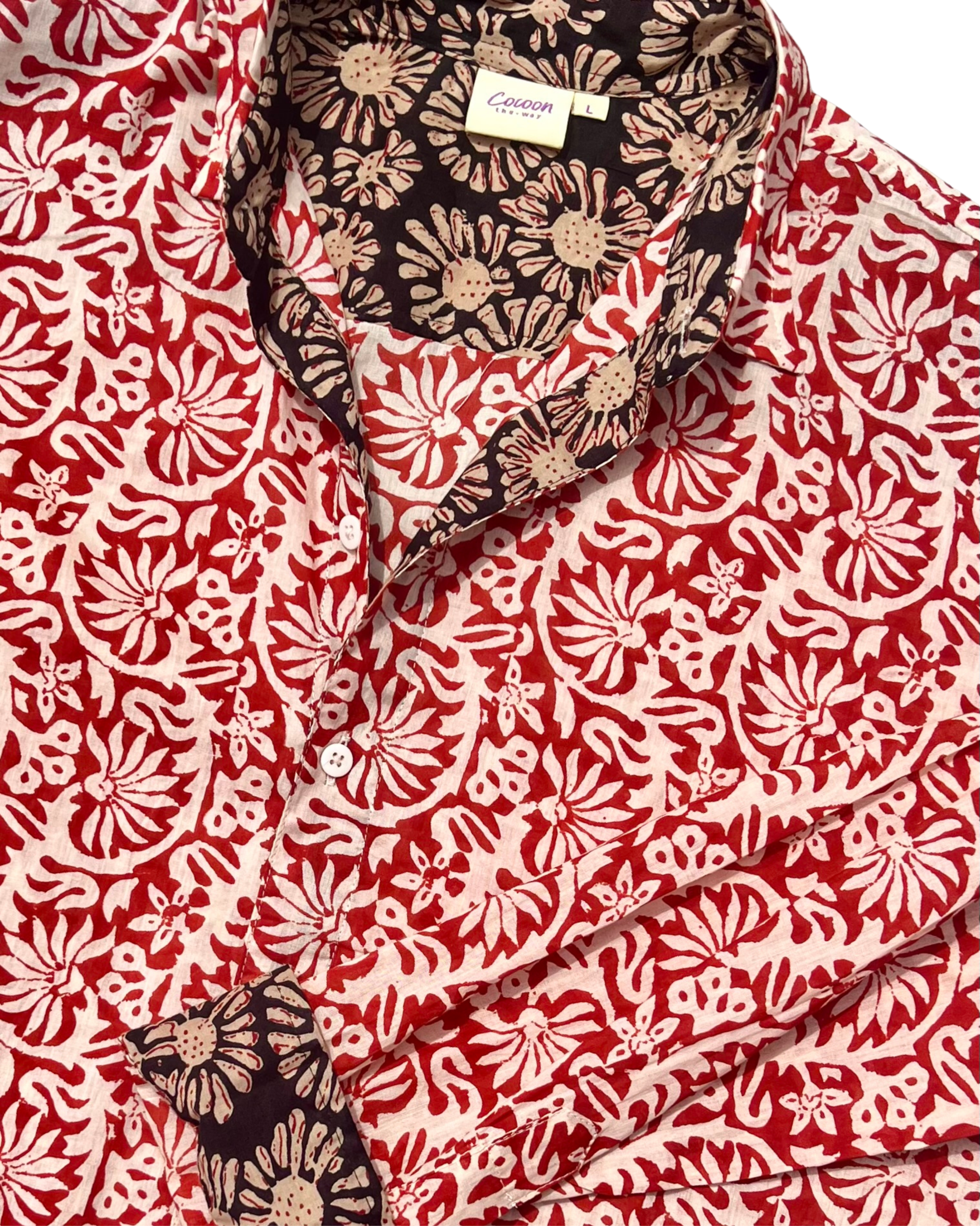 SAIRA Long Sleeve Shirt Sevilla featuring bold floral patterns in red and cream colors.