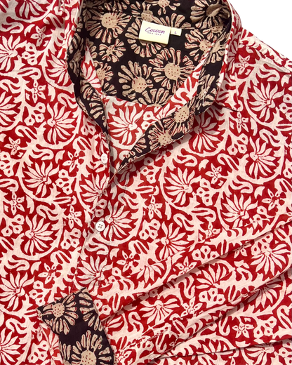 SAIRA Long Sleeve Shirt Sevilla featuring bold floral patterns in red and cream colors.