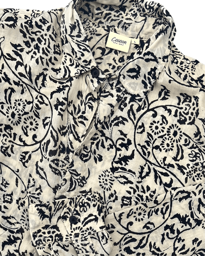 SAIRA Long Sleeve Shirt in cream with black floral pattern, showcasing stylish design and breathable cotton fabric — The Cocoon Way