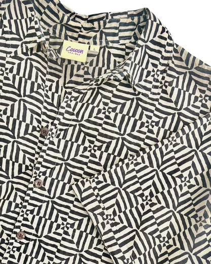 SAIRA Short Sleeve Shirt featuring a stylish black and white geometric pattern and smooth Cambric cotton fabric — The Cocoon Way