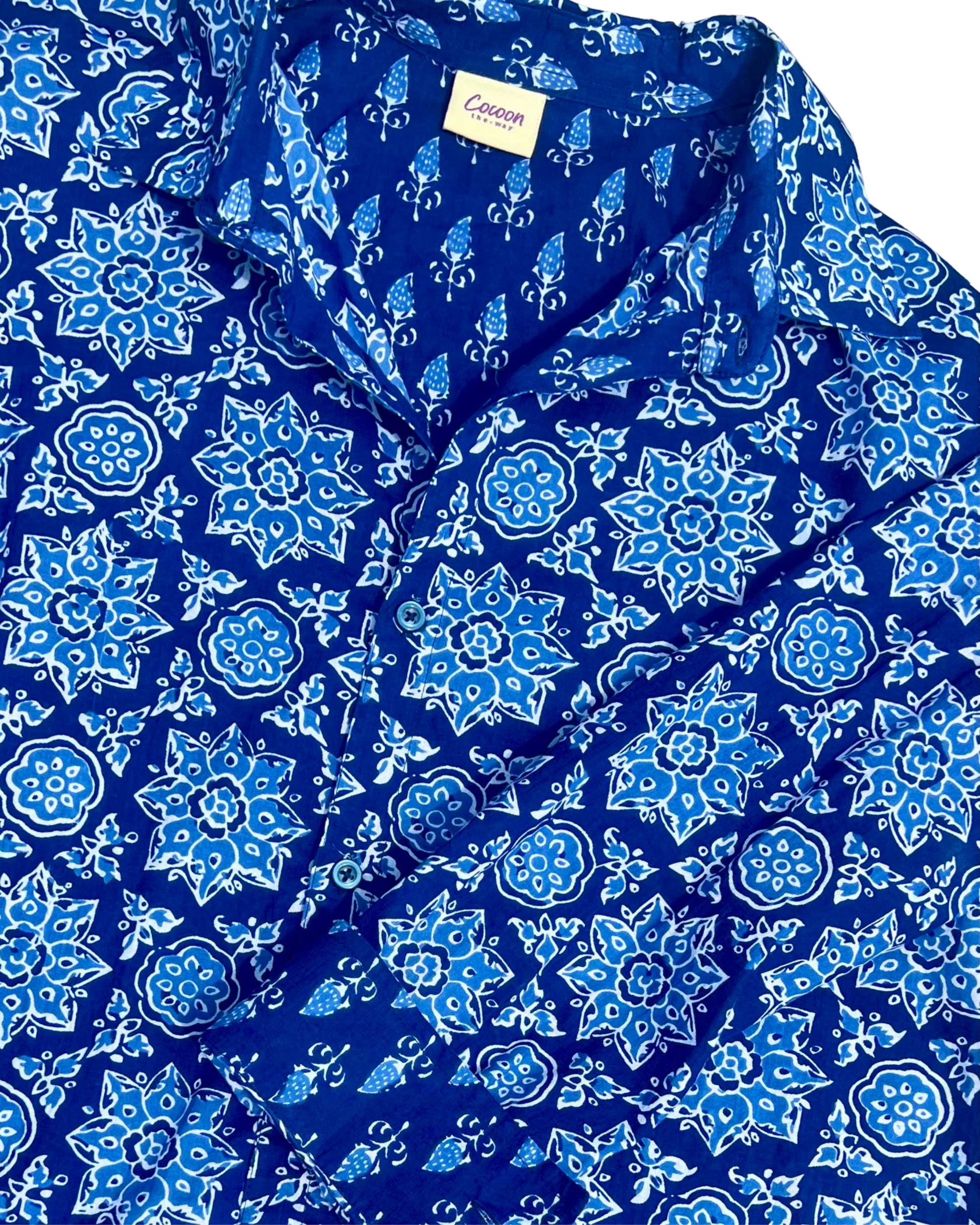 PADMA Long Sleeve Shirt in blue floral pattern, crafted from soft Cambric cotton for comfort and elegance.