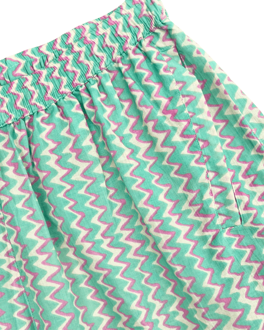 PADMA Cotton Shorts Neon Bloom featuring a colorful zigzag pattern and elastic waistband — The Cocoon Way