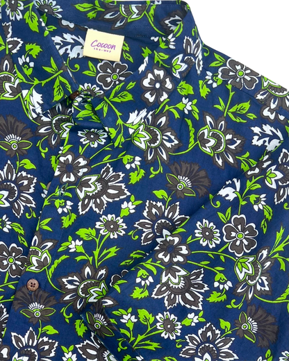 PADMA Short Sleeve Shirt featuring a vibrant night flower pattern in blue, green, and black hues — The Cocoon Way